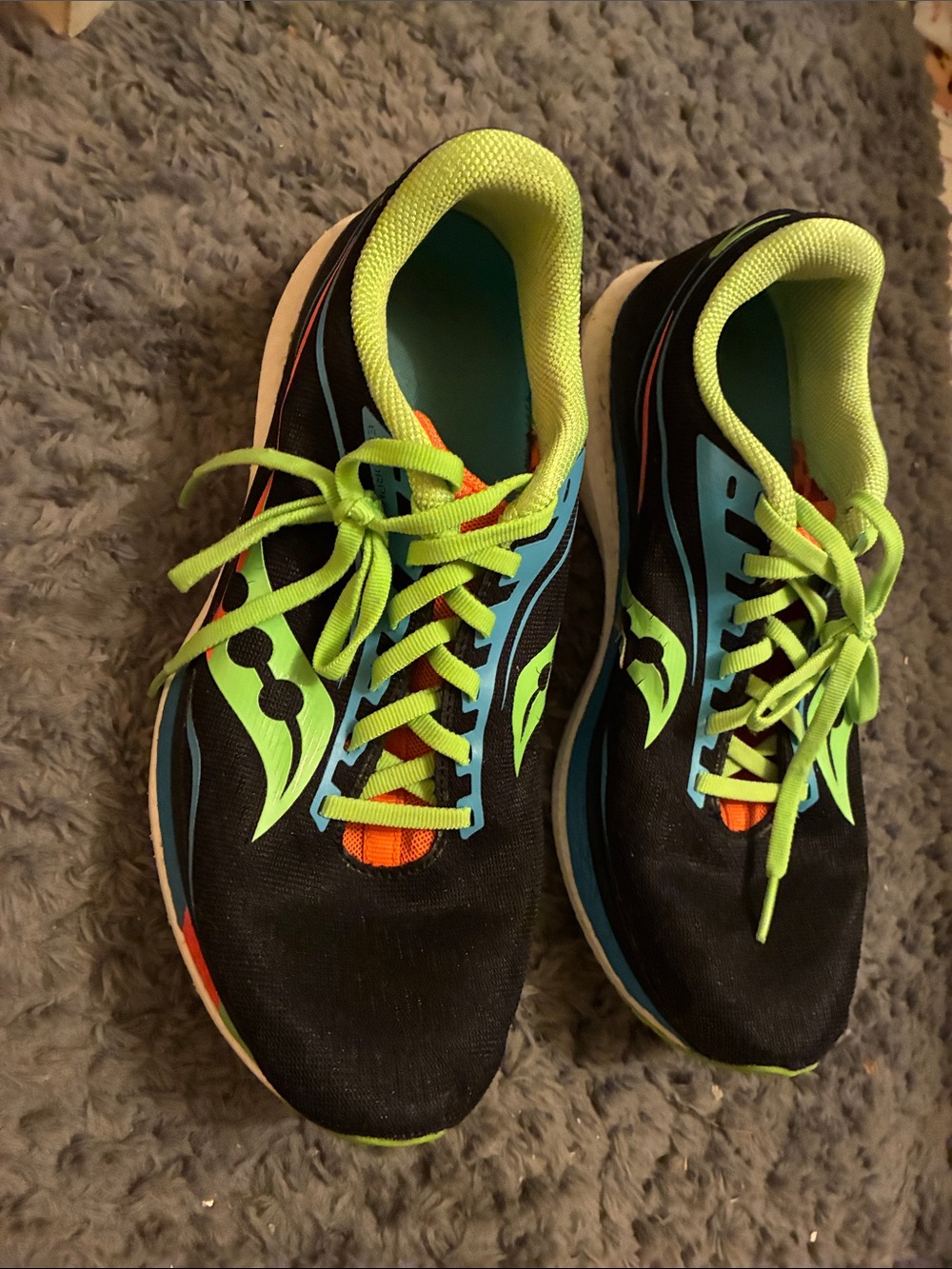 Saucony Black Athletic Shoes with Lime Green and Blue Accents